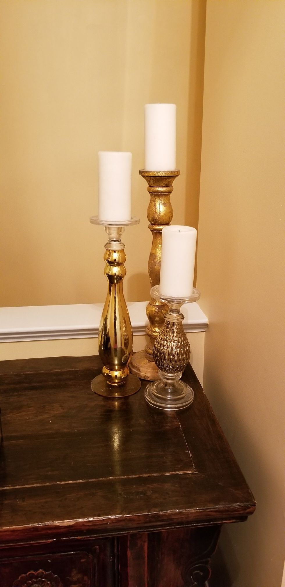 Triple tiered gold candle holders