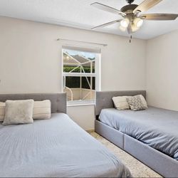 Twin Bed, Gray upholstered. Good Condition