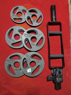 2" HOLE  OLYMPIC PLATES 50LBs.   4-10s. 2-5s.  AND  TRICEP BAR 
11525 S HALSTED DUNKIN DONUTS/7111.S WESTERN WALGREENS 
70$  CASH ONLY AS IS 