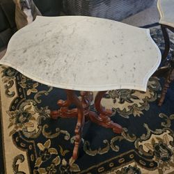 2 marble and wood In tables.