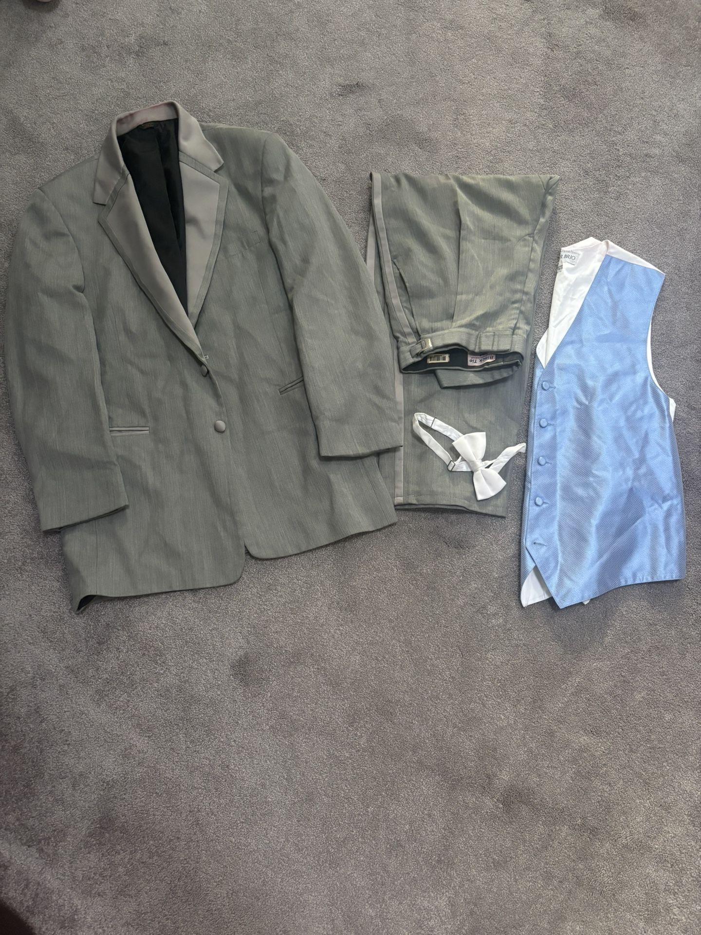 Large two button suit with adjustable pants vest, and bowtie Halloween costume