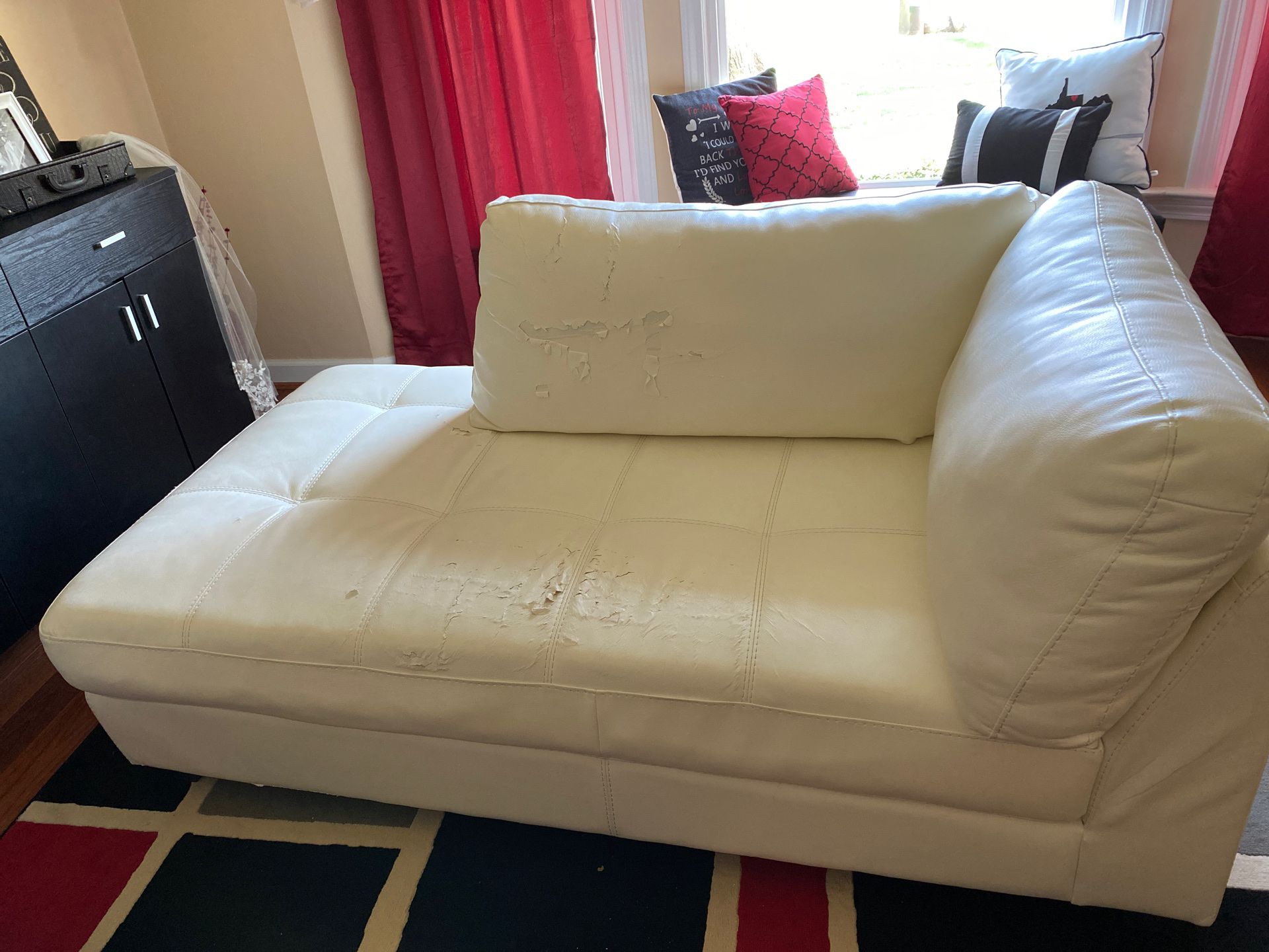 White bonded leather couch