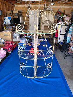 Beautiful three tiered brass and glass corner shelves