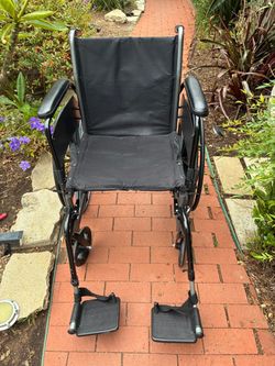 Black Folding Wheelchair with Footrests