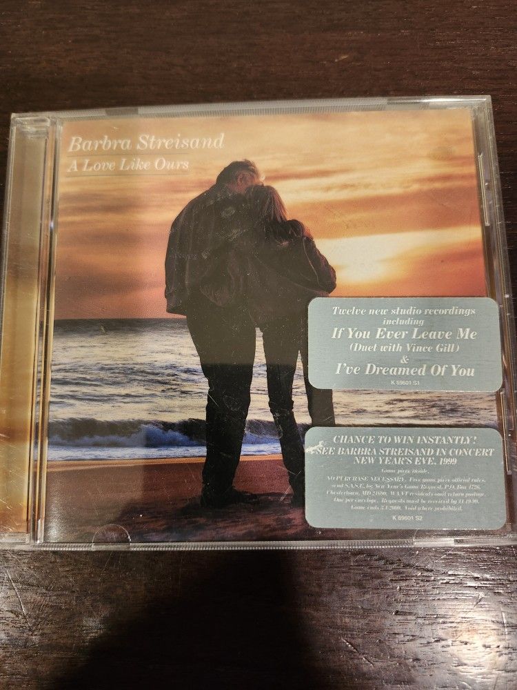 This CD features the beloved vocalist Barbra Streisand with her album "Love like Ours". It was released in 1999 under the record labels Sony and Sny.