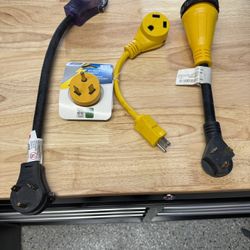 Four (4) RV Electrical Adaptors