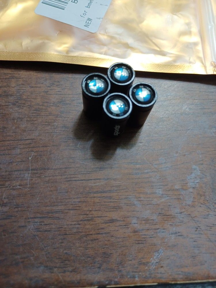 BMW Sports" branded tire valve caps