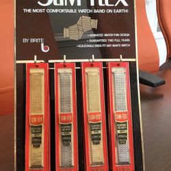 1973 Brite Men’s Slim-Flex display including 12 watchbands 6 goldtone and 6 silvertone watchbands.  Vintage collectible
