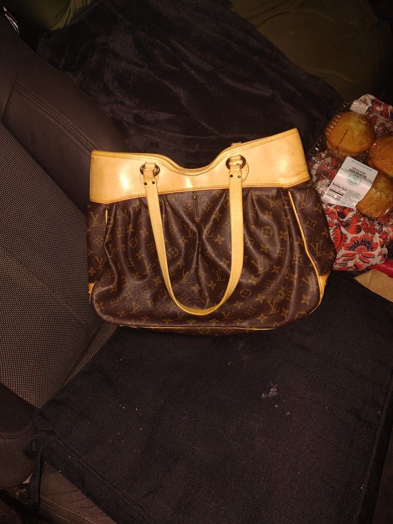 Louis Vuitton Bowtie Purse