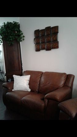 Beautiful New Luxury Leather Loveseat and Matching Recliner $475.