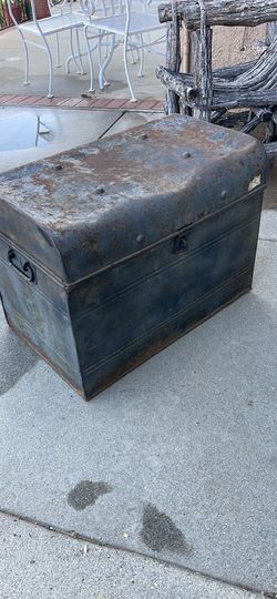 Vintage rusted metal trunk