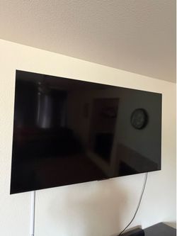 75” TCL 4K Smart TV with Full Motion Wall Mount