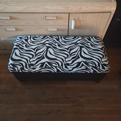 zebra-print storage ottoman bench