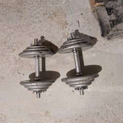 70 lb. Of Standard Weights On Dumbbell Star Lock Handles.