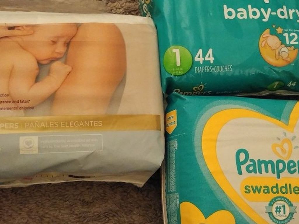 4 Packs Of Size 1 Baby Diapers