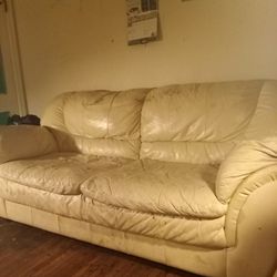 Leather Tan Love seat 