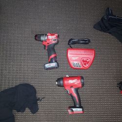 Milwaukee Hammer Drill , Bat , Chargerc