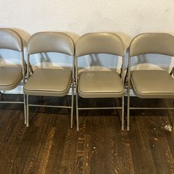 4 Folding Chairs 