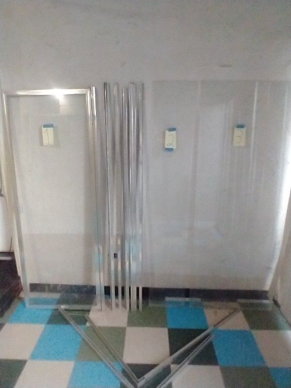 $250 Or Best Offer . Corner Glass Shower Doors , Complete With Brackets. Measurements are approximate see pic. Can Help Deliver Hablo Español