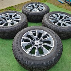 BRAND NEW CHEVY SILVERADO/ GMC SIERRA WHEELS WITH NEW GOODYEAR WRANGLER AT TIRES 275/60R20