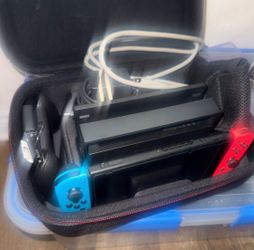 Nintendo Switch with Neon Joy-Cons and Carrying Case