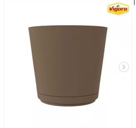 Kyra Large Chocolate Plastic Round Planter with Attached Saucer (20 in. L x 20 in. W x 17.3 in. H)