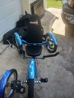 MOBO TRITAN TRICYCLES 1 ADULT 1 TEENS KIDS PAID 1100 BOTH BIKES SELL 120 BOTH ADULTS BRAND NEW TEENS GENTLEY USED