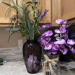 Three vases and flowers