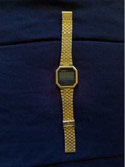 Nixon digital gold watch