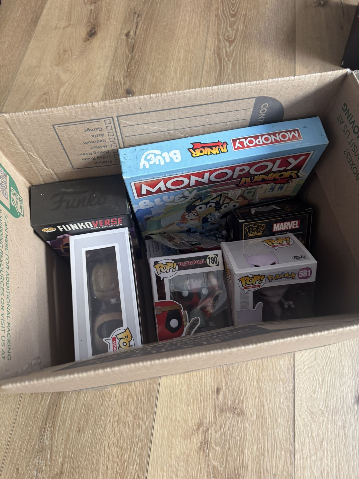 Box with various games and toys