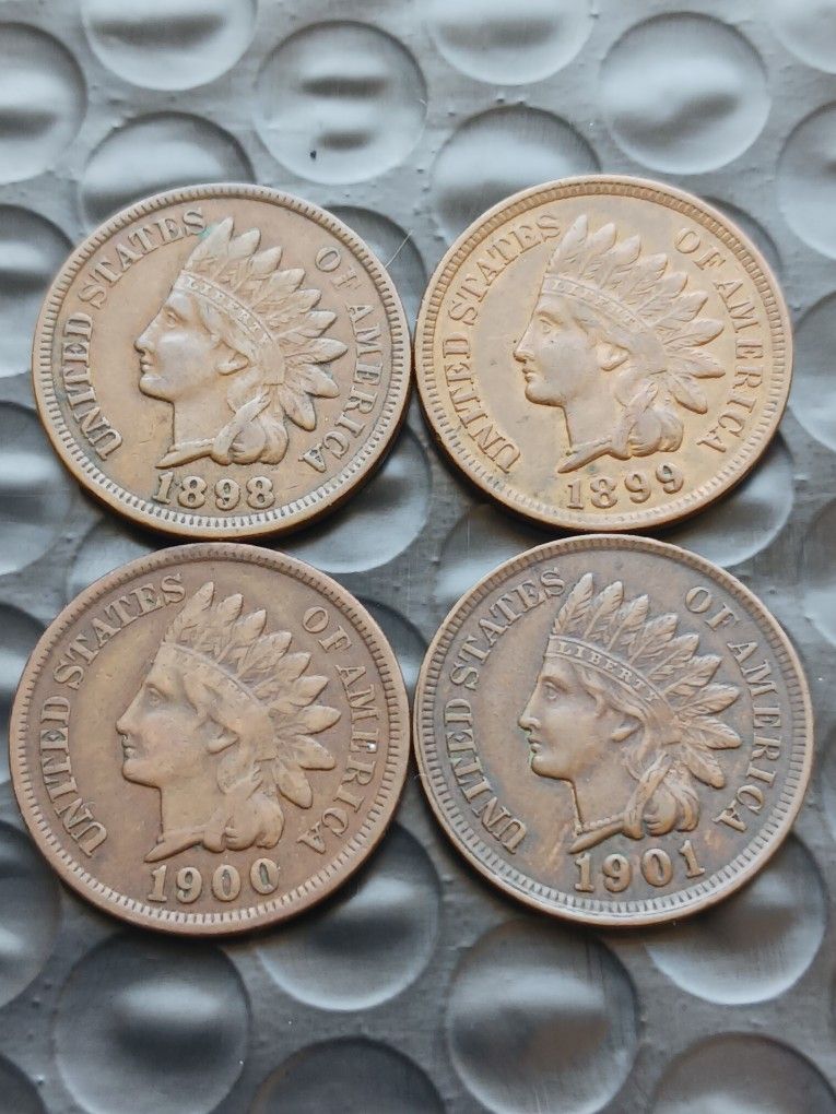 4 CONSECUTIVE 1898 TO 1901 INDIAN CENTS VERY FINE TO ALMOST UNCIRCULATED SHOWING LIBERTY AND PARTIAL DIAMONDS