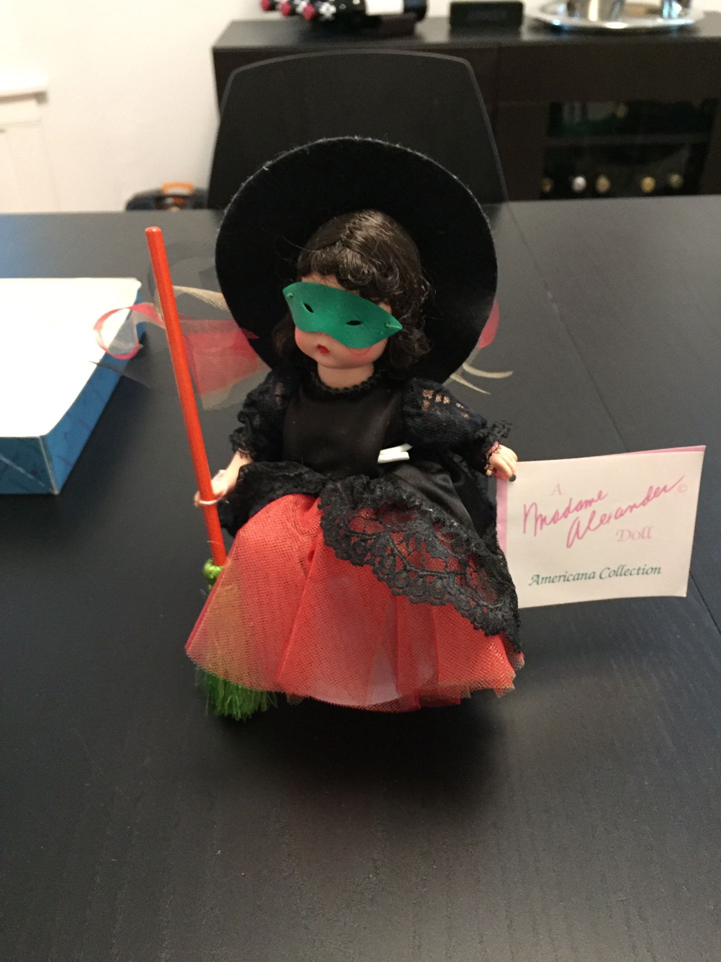 Madame Alexander's "Halloween Witch" sleepy-eye 8" doll is in excellent condition and includes Madame Alexander Doll, Witches Hat, Mask, etc