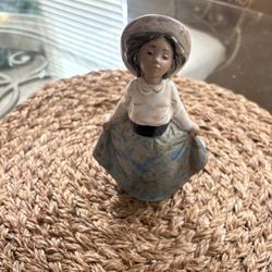 Lladro Nao “Girl Preparing to Bow” Figurine