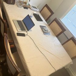 Wooden Dining Table With 6 Chairs. Can be dismantled. 