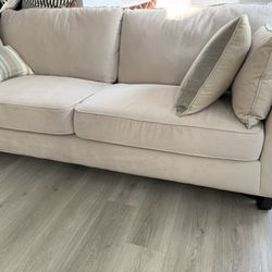 Four Seater Sofa Cream color In Nice Fabric 