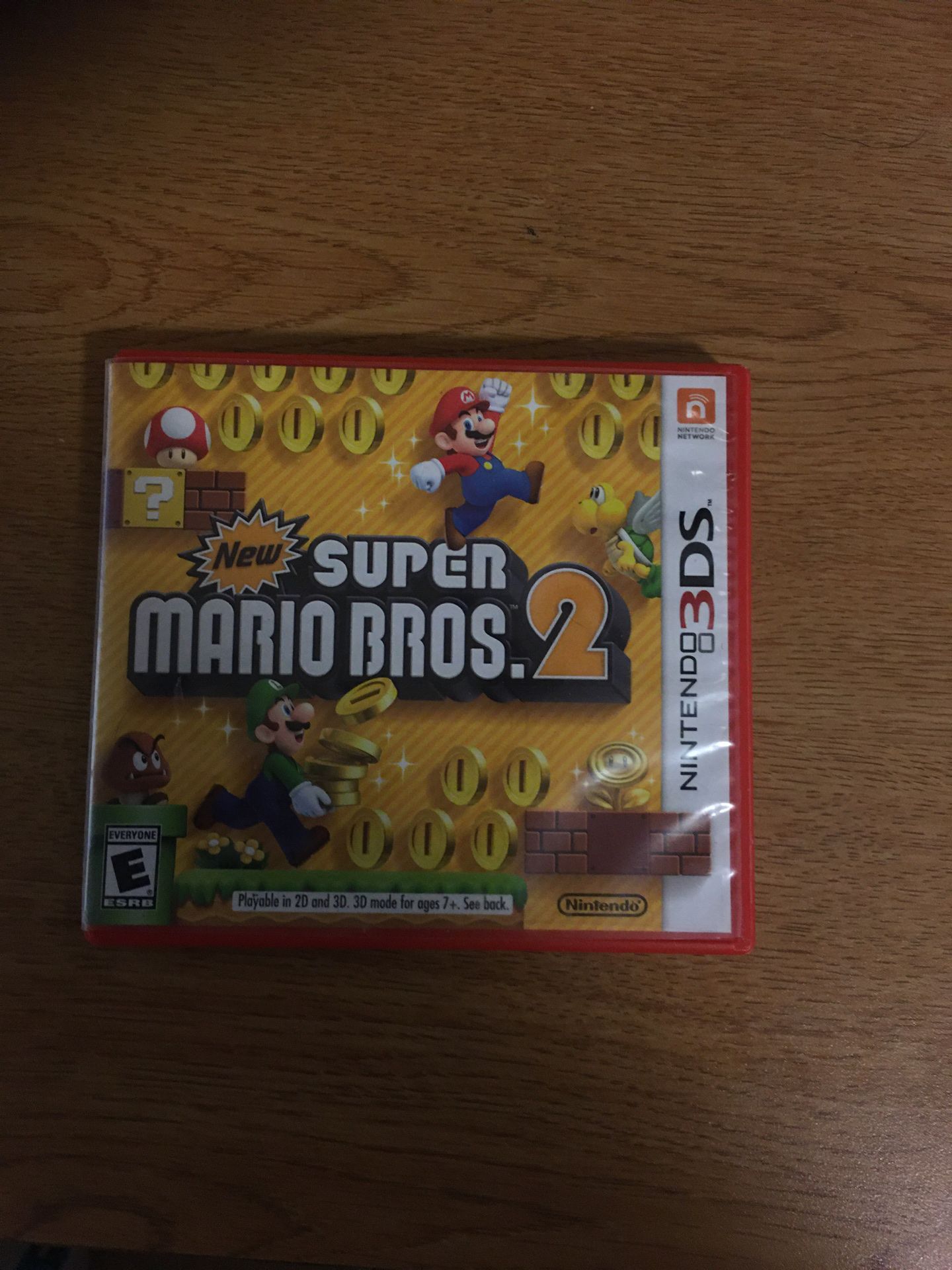 Two 3DS Games - One in Original Case with Manual, One Not in Original Case (Super Mario Bros. 2, Luigi's Mansion Dark Moon)