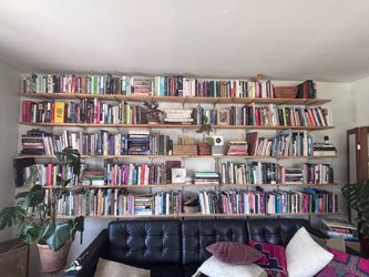 Huge bookshelf, wood and steel track shelving