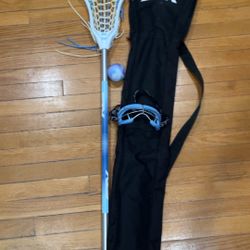 STX women’s lacrosse stick blue and white 
