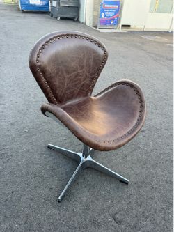Brown Saddle Chair