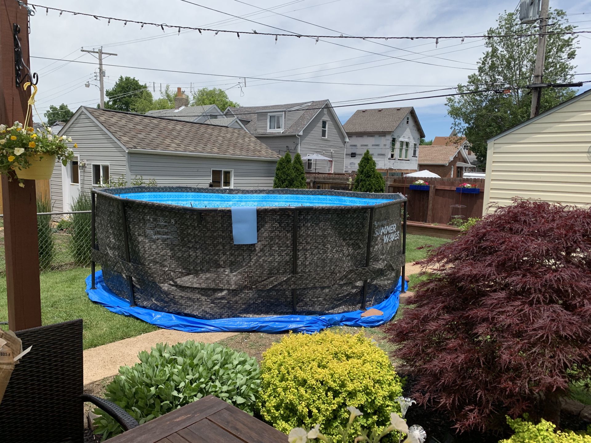 14 foot 48 inches deep Vinyl pool with metal poles