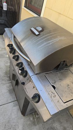 Brick man grill/smoker/rotisserie