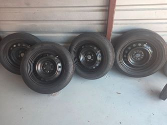 Set of 4 Tires on Steel Wheels