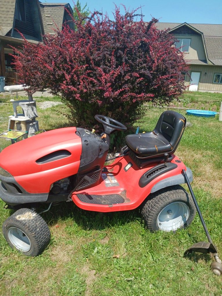 Running Riding Lawn Mower