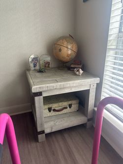 Side table with outlet