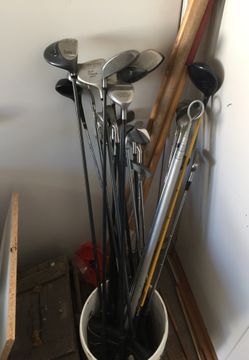 Golf clubs. Assorted sizes. $ 10