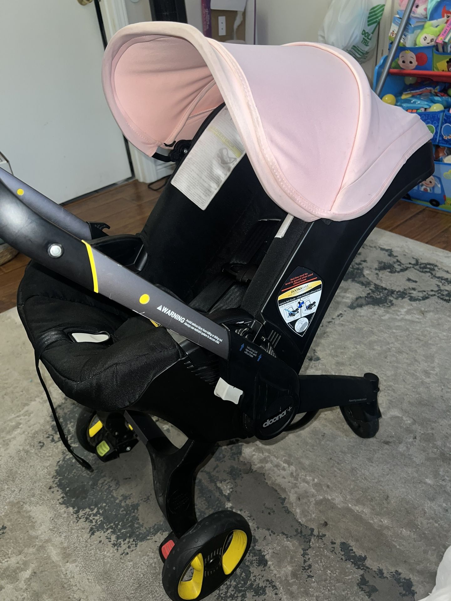 Pink Doona Car Seat/ Stroller