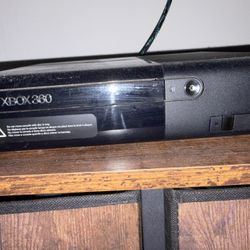 X box 360 console with control and 10 games in good condition