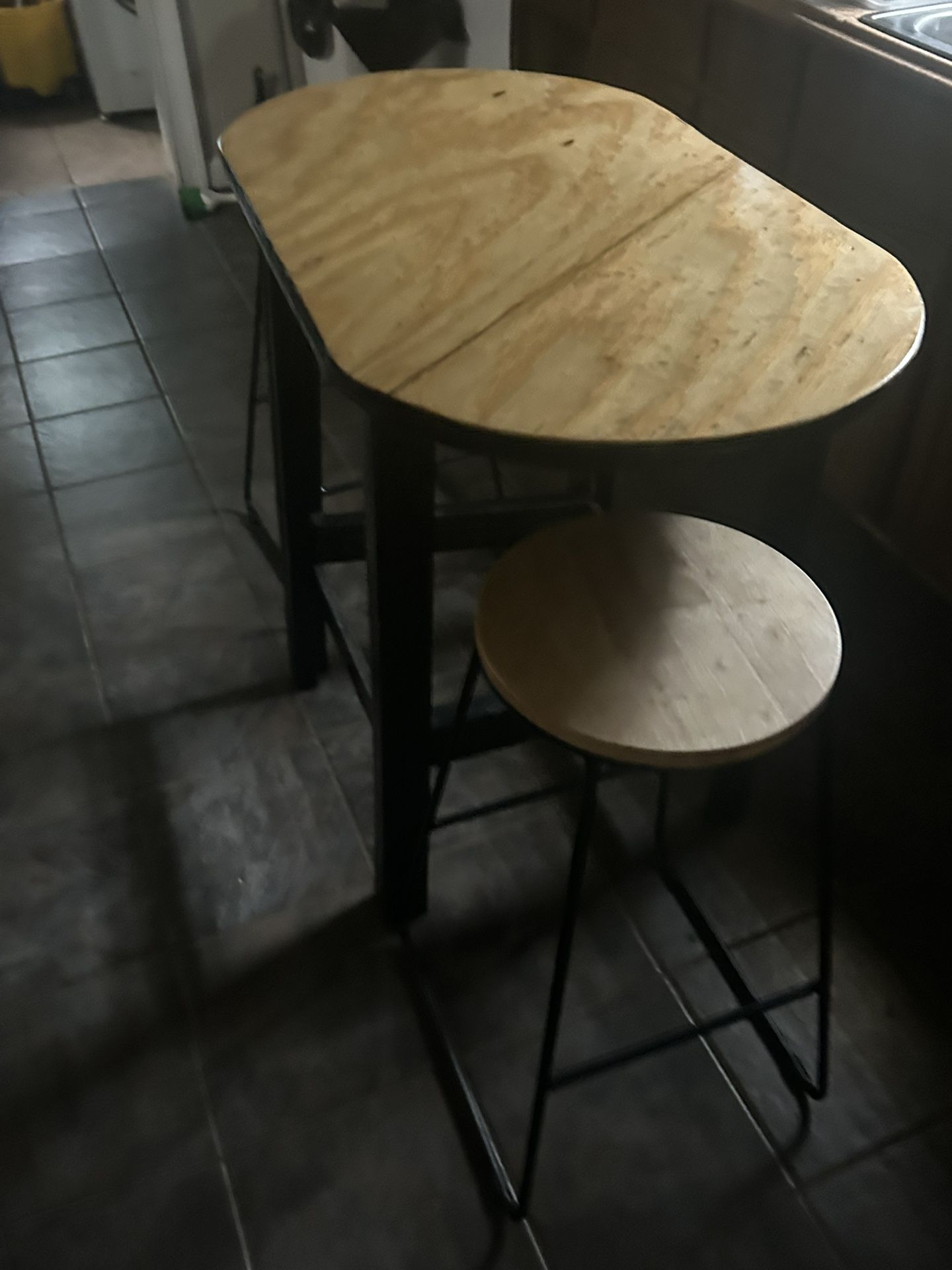 Wood And Black Colored Dining Table