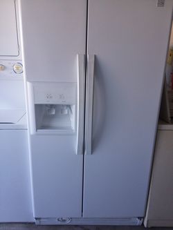 Side by side refrigerator with 30-day warranty and delivery included!!