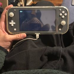 Nintendo Switch Lite With Case And Screen Protector. UCLA Sticker In The Back Only Get If You Are Admitted 